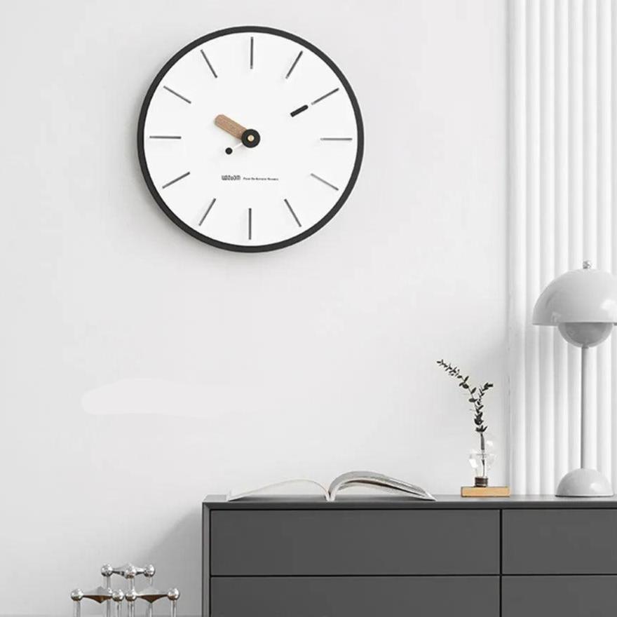 Horloge murale moderne 56 x 36 cm design circulaire et Horloge murale moderne 56 x 36 cm design circulaire et